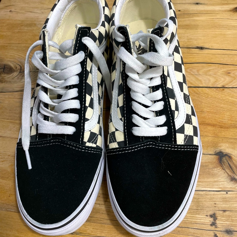 Never worn before black and white checkered low top lace up vans